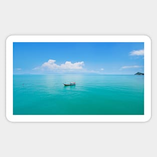 Aerial panoramic view of fishing boat on emerald sea Sticker